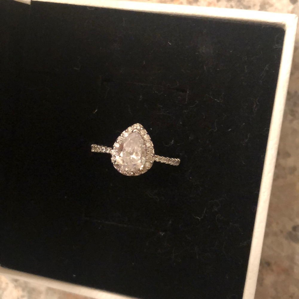 Australian crystal pear ring with halo